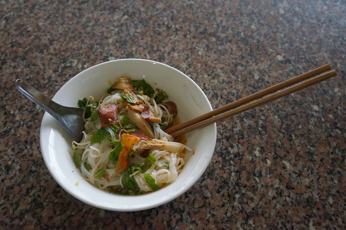 Phở chua (sour noodles) with grilled pork and local sausage