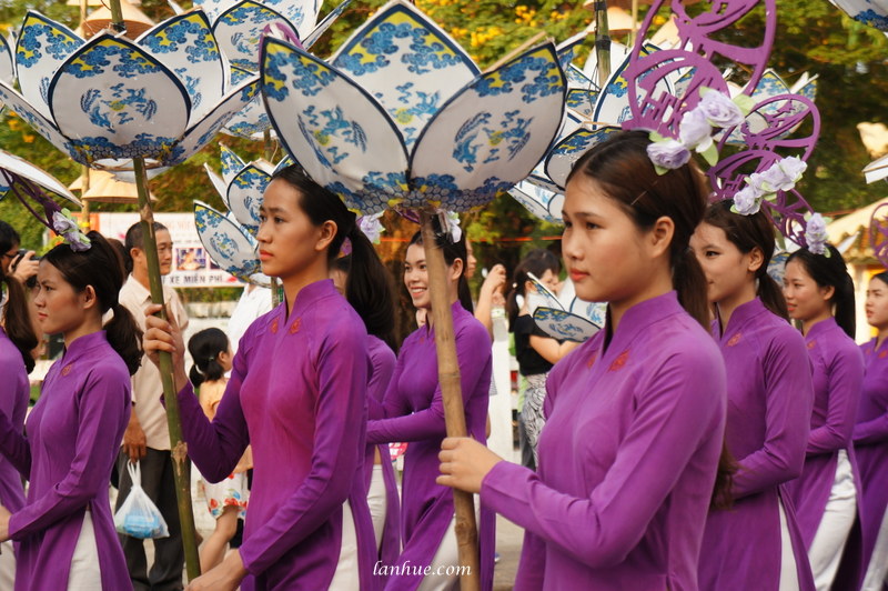 Girls in áo dài at a festival