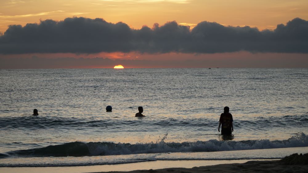 Sun rises at Thuận An Beach